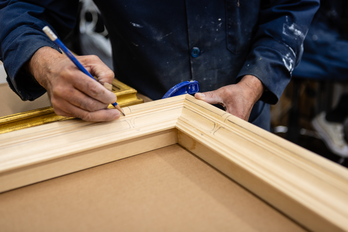 Lowy Master Craftsman Hand Making an Antique Frame Reproduction