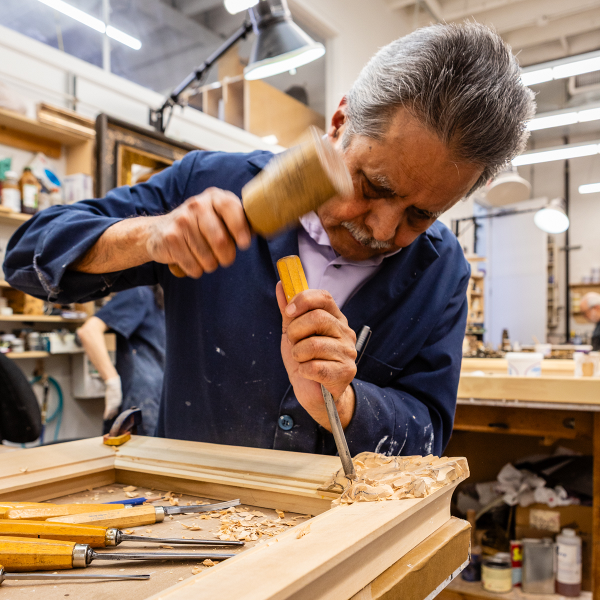 Lowy Master Craftsman Hand Carving a Frame