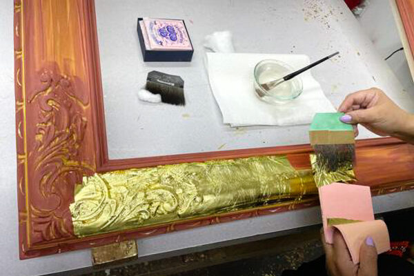 Applying Gold Leaf Over the Clay Bole