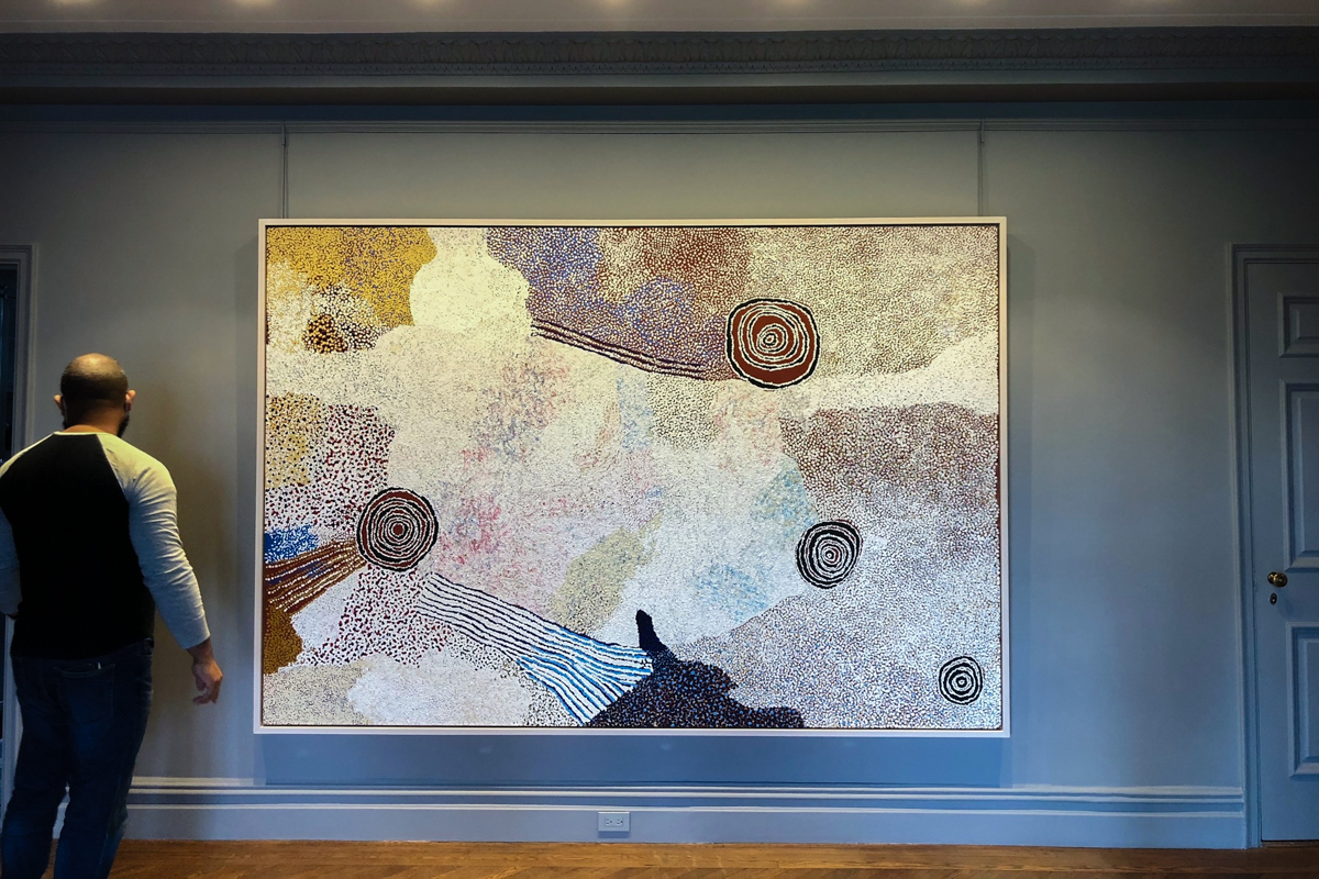 Installing a Bill Whiskey Tjapaltjarri Painting in a Private Residence
