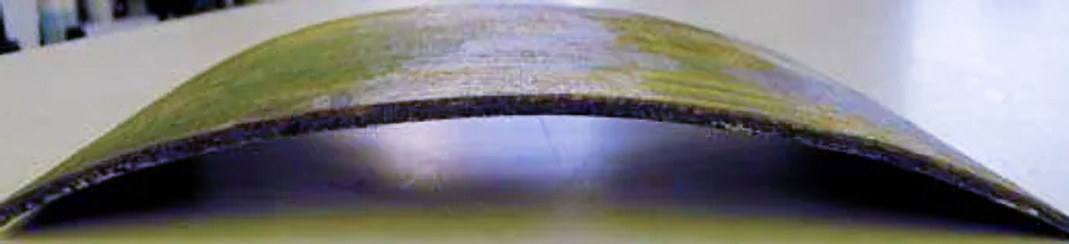 The warped John Leslie Breck panel before conservation